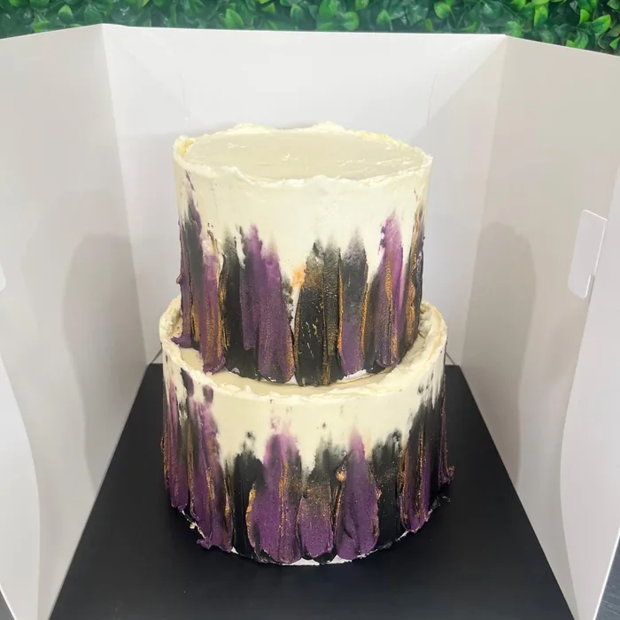 Two-tier purple watercolour cake
