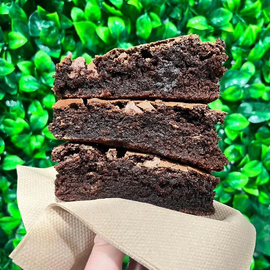 Stack of fudgy brownies made with no added gluten ingredients