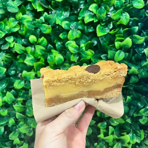 Cookie caramel slice with a soft caramel centre